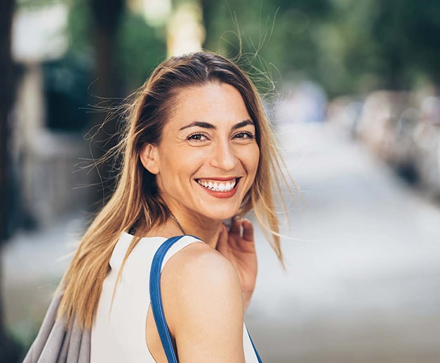 Girl happily smiling after Cosmetic dentistry in Altamonte Springs