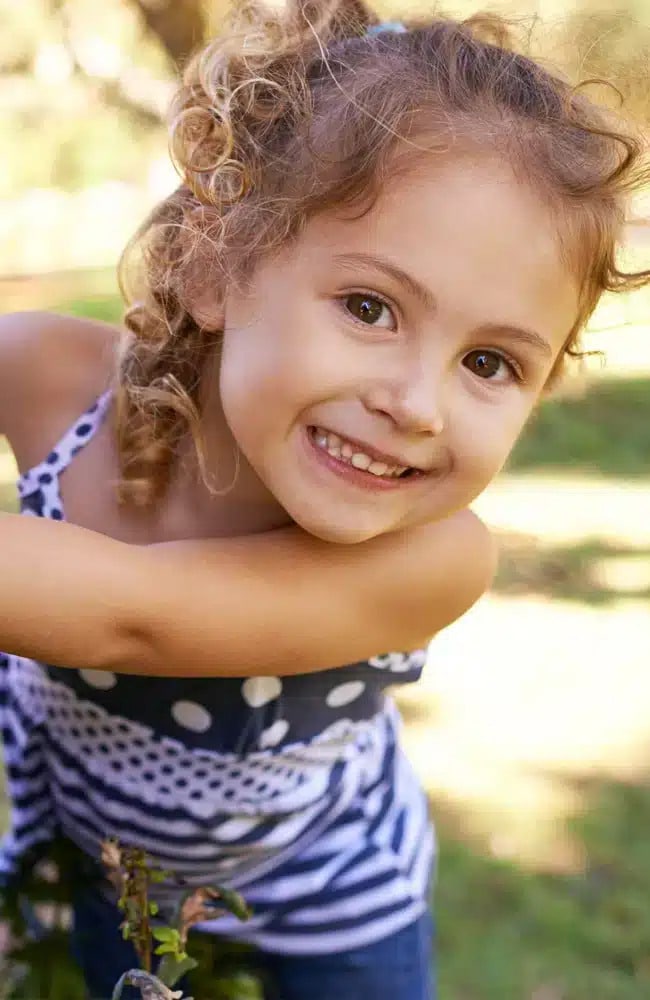 Kid smiling for pediatric dentistry session at Altamonte Springs