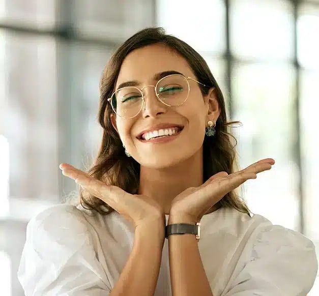 Women happily smiling after putting on the veneers at Darley Dental Care